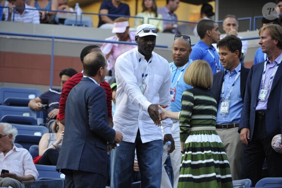 Anna Wintour et Michael Jordan à l'occasion du match de Roger Federer face à Marinko Matosevic lors du premier tour de l'US Open, à l'USTA Billie Jean King National Tennis Center de New York le 26 août 2014