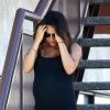 Mila Kunis, enceinte, quitte son cours de yoga à Sherman Oaks, le 28 août 2014.