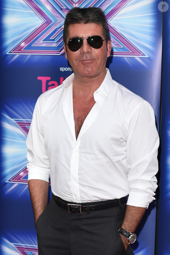 Simon Cowell lors du lancement de l'émission "The X Factor" au Ham Yard Hotel à Londres, le 27 août 2014.