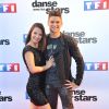 Rayane Bensetti et Denitsa Ikonomova lors du photocall de présentation de la nouvelle saison de "Dance avec les Stars 5" au pied de la tour TF1 à Paris, le 10 septembre 2014