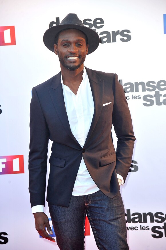 Corneille lors du photocall de présentation de la nouvelle saison de "Dance avec les Stars 5" au pied de la tour TF1 à Paris, le 10 septembre 2014