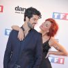 Miguel Angel Munoz et Fauve Hautot lors du photocall de présentation de la nouvelle saison de "Dance avec les Stars 5" au pied de la tour TF1 à Paris, le 10 septembre 2014
