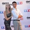 Tonya Kinzinger et Maxime Dereymez lors du photocall de présentation de la nouvelle saison de "Dance avec les Stars 5" au pied de la tour TF1 à Paris, le 10 septembre 2014