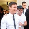 Lionel Messi et sa compagne Antonella Rocuzzo se rendent dans la boutique Dolce & Gabanna en compagnie de Domenico Dolce à Milan, le 7 septembre 2014. 