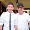 Lionel Messi et sa petite amie Antonella Rocuzzo se rendent dans la boutique Dolce & Gabanna en compagnie de Domenico Dolce à Milan, le 7 septembre 2014.