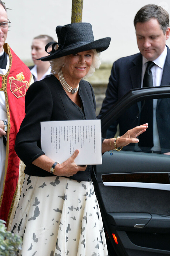 Camilla Parker Bowles, souriante, le 11 septembre 2014 à l'église Saint Paul de Londres lors du service religieux à la mémoire de Mark Shand, décédé en avril 2014.