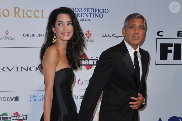 George Clooney et sa fiancée Amal Alamuddin à la soirée "Celebrity Fight Night" à Forte dei Marmi (non loin de Florence) le 7 septembre 201