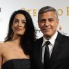 George Clooney et sa future femme Amal Alamuddin à la soirée "Celebrity Fight Night" à Forte dei Marmi (non loin de Florence) le 7 septembre 201