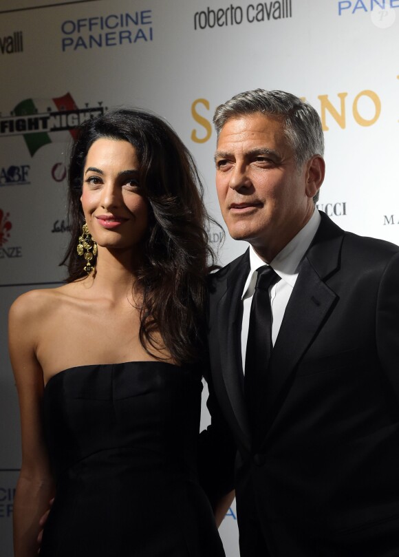 George Clooney et sa fiancée Amal Alamuddin à la soirée "Celebrity Fight Night" à Forte dei Marmi (non loin de Florence) le 7 septembre 201