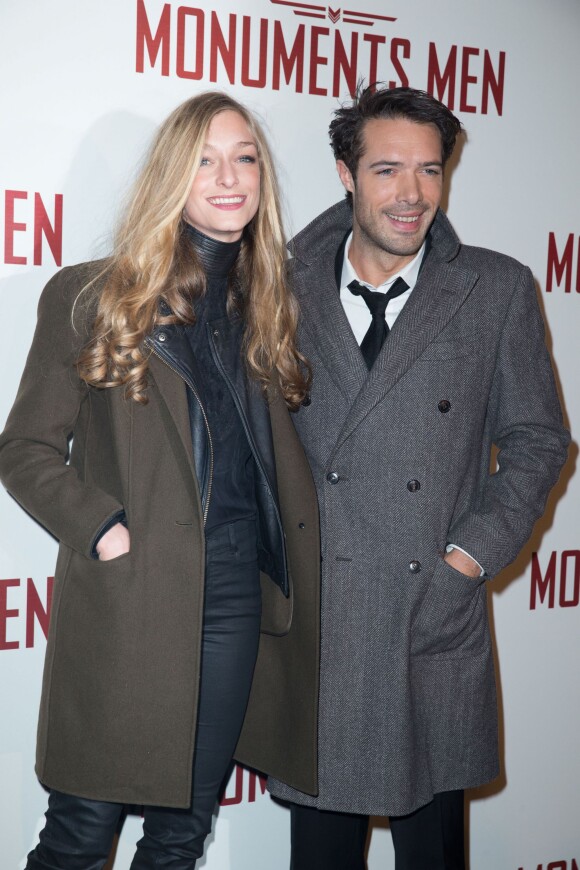 Nicolas Bedos et sa compagne Zoé à la première du film "Monuments Men" à l'UGC Normandie à Paris, le 12 février 2014.
