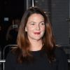 Drew Barrymore lors du show de Stella McCartney, "Green Carpet Challenge" dans le cadre de la fashion week à Londres, le 14 septembre 2014