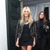 Heidi Klum, sexy, assiste au défilé Versace printemps-été 2015 à Milan le 19 septembre 2014 
