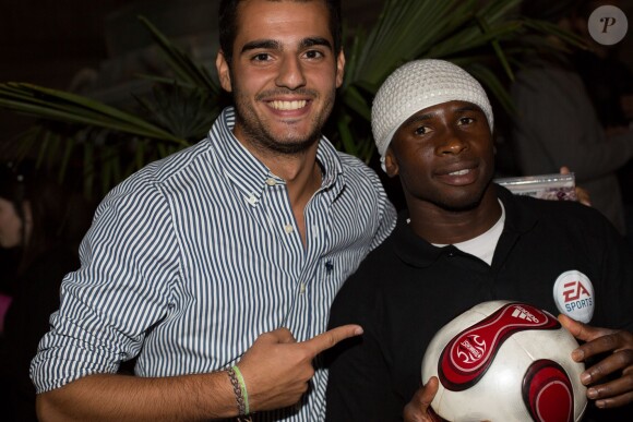 Stéphane Abreu et Iya Traoré - Soirée de lancement du jeu vidéo "FIFA 2015" à l'Opéra Garnier Restaurant à Paris le 22 septembre 2014.