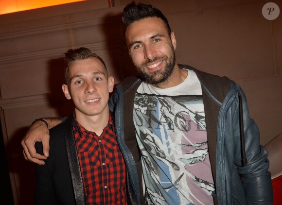 Lucas Digne et Salvatore Sirigu - Soirée de lancement du jeu vidéo "FIFA 2015" à l'Opéra Garnier Restaurant à Paris le 22 septembre 2014.