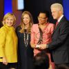 Hillary Clinton, Chelsea Clinton, Graca Machel et Bill Clinton à la 10e rencontre annuelle des Clinton Global Initiative à New York, le 23 septembre 2014