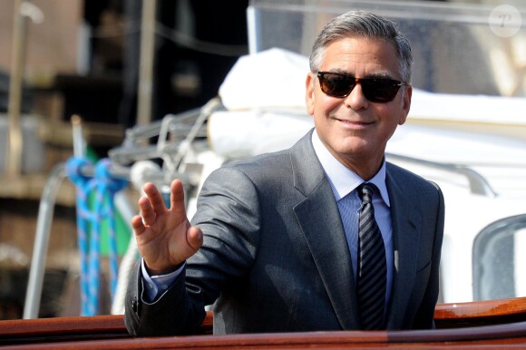 George Clooney et sa femme Amal Alamuddin quittant l'hôtel Cipriani pour se rendre au palais de Ca Farsetti à Venise, le 29 septembre 2014 pour leur mariage civil à la mairie de Venise qui va officialiser la cérémonie de samedi soir.