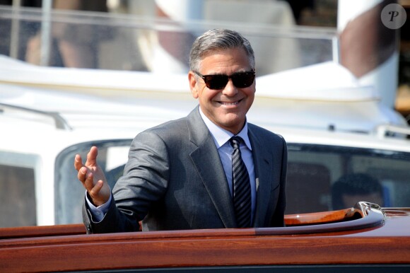 George Clooney et sa femme Amal Alamuddin quittant l'hôtel Cipriani pour se rendre au palais de Ca Farsetti à Venise, le 29 septembre 2014 pour leur mariage civil à la mairie de Venise qui va officialiser la cérémonie de samedi soir.