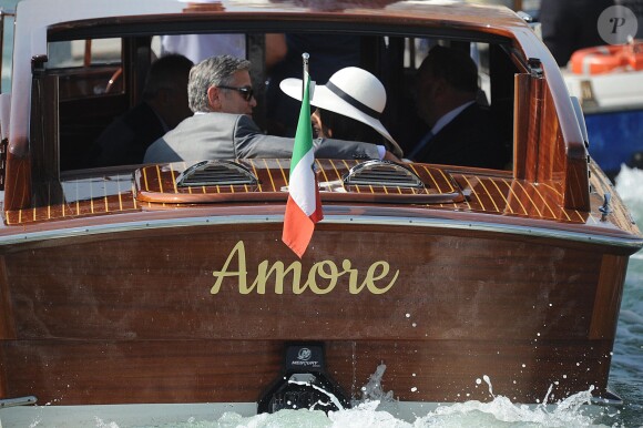 George Clooney et sa femme Amal Alamuddin quittant l'hôtel Cipriani pour se rendre au palais de Ca Farsetti à Venise, le 29 septembre 2014 pour leur mariage civil à la mairie de Venise qui va officialiser la cérémonie de samedi soir.