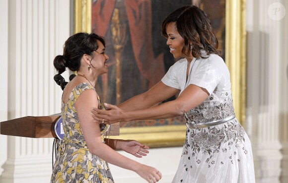 Norah Jones et  Michelle Obama à la Maison-Blanche, le 12 mai 2014. 