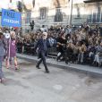 Défilé "Chanel" collection prêt-à-porter printemps-été 2015 lors de la fashion week au Grand Palais à Paris le 30 septembre 2014. Le défilé Chanel était placé sous le signe de la manifestation. Le mot d'ordre ? "Faites la mode, pas la guerre".