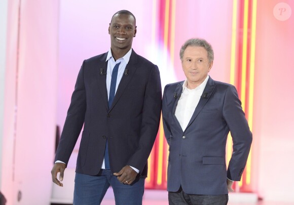 Omar Sy (invité principal) et Michel Drucker - Enregistrement de l'émission "Vivement Dimanche prochain" le 1er octobre 2014 au Studio Gabriel à Paris, pour une diffusion le 5 octobre 2014