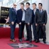Les chanteurs Joey McIntyre, Jordan Knight, Donnie Wahlberg, Danny Wood et Jonathan Knight des New Kids On The Block reçoivent leur étoile sur le Hollywood Walk of Fame de Los Angeles, le 9 octobre 2014.