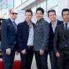 Joey McIntyre, Jordan Knight, Donnie Wahlberg, Danny Wood et Jonathan Knight du groupe New Kids On The Block reçoivent leur étoile sur le Hollywood Walk of Fame de Los Angeles, le 9 octobre 2014.