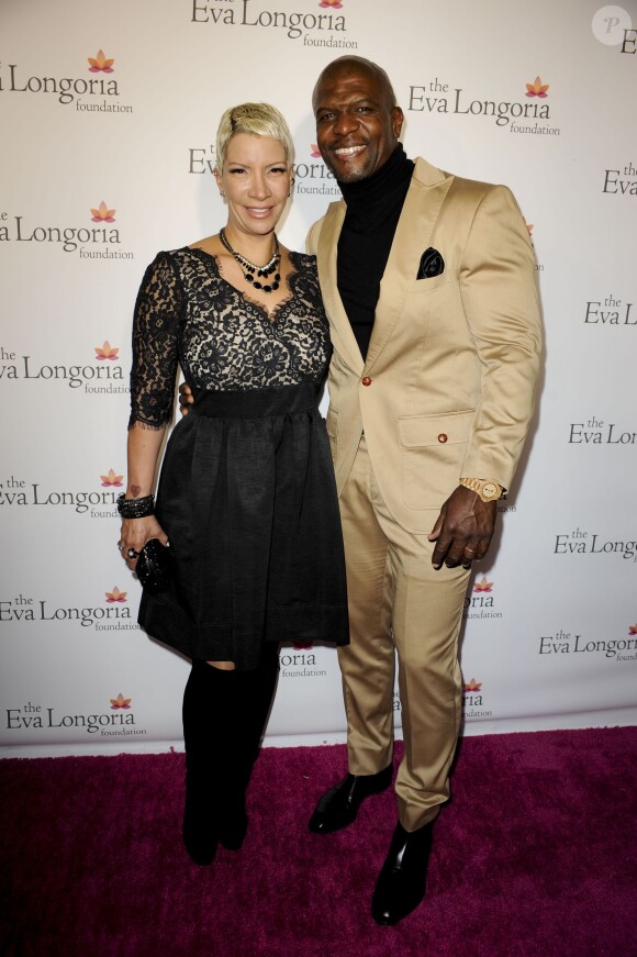 Terry Crews et sa femme Rebecca Crews - Dîner de gala pour la fondation d'Eva Longoria au restaurant Beso à Los Angeles, le 9 octobre 2014.