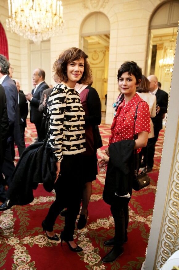 Mélanie Doutey et Audrey Tautou - Cérémonie de remise des insignes de Grand Officier de la Légion d'honneur à Gilles Jacob par le président de la République au palais de l'Elysée le 9 octobre 2014.