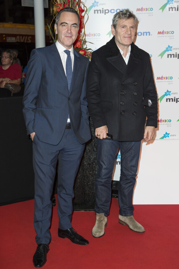 James Nesbitt et Tcheky Karyo sur le tapis rouge de la soirée du Mipcom à l'hôtel Martinez à Cannes, le 13 octobre 2014.