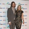 Christopher Backus et Mira Sorvino sur le tapis rouge de la soirée du Mipcom à l'hôtel Martinez à Cannes, le 13 octobre 2014.