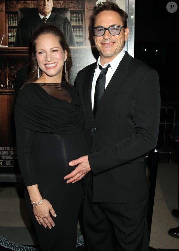 L'acteur Robert Downey Jr et sa femme Susan Downey, enceinte, à la première de "The Judge" à Beverly Hills, le 1er octobre 2014.