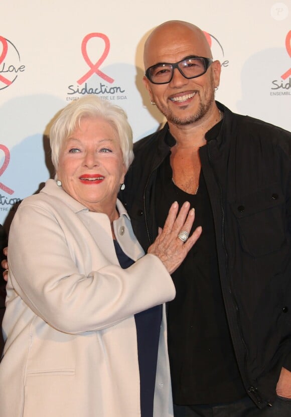 Line Renaud et Pascal Obispo lors du photocall du lancement de l'album des 20 ans de Sidaction à l'Elysée Biarritz, à Paris le 22 octobre 2014.