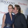 Johnny et Laetitia Hallyday plus in love que jamais lors de la soirée De Grisogono à Paris le 23 octobre 2014.