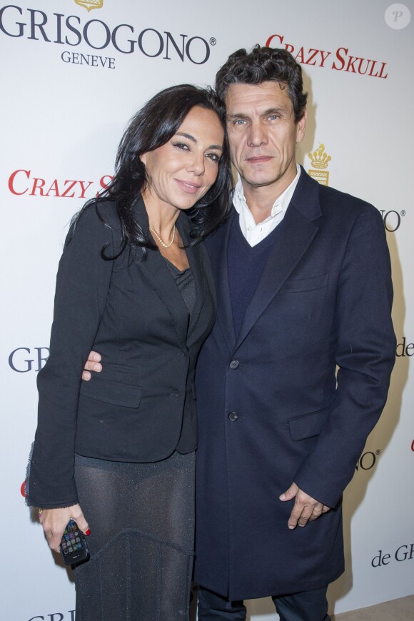 Sandra Zeitoun et Marc Lavoine lors de la soirée De Grisogono à Paris le 23 octobre 2014. 