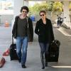 Renée Zellweger et son compagnon Doyle Bramhall II arrivent a l'aéroport LAX de Los Angeles, le 10 février 2013.
