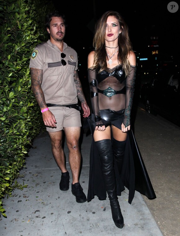 Audrina Patridge et Corey Bohan arrivent à la soirée Halloween organisée par Matthew Morrison au Hyde Nightclub dans le quartier de West Hollywood à Los Angeles, le 25 octobre 2014.