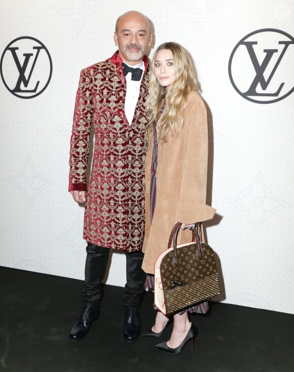 Christian Louboutin et Ashley Olsen assistent au dîner "Louis Vuitton celebrating Monogram" organisé par Louis Vuitton au MoMA. New York, le 7 novembre 2014.