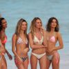 Exclusif - Lais Ribeiro, Behati Prinsloo et Candice Swanepoel en plein shooting pour Victoria's Secret sur une plage de Saint-Barthélemy. Le 9 novembre 2014.