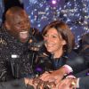 Omar Sy, en présence de la maire de Paris Anne Hidalgo, assure le coup d'envoi des illuminations sur l'avenue des Champs-Élysées à Paris le 20 novembre 2014.