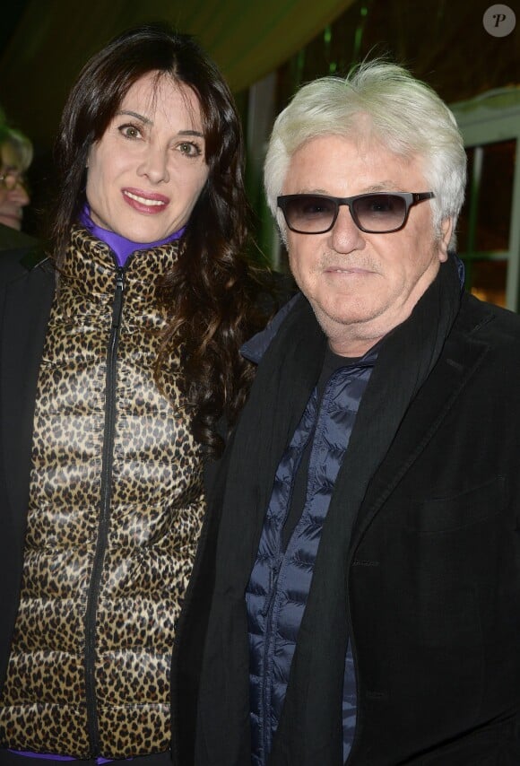 Marc Cerrone et sa femme Jill lors de la soirée "Brésil Team" au marché de Noël des Champs Elysées à Paris le 5 décembre 2014