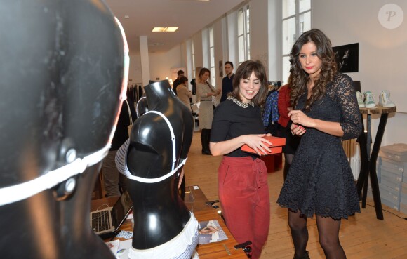Malika Ménard au concept Store L'Escabeau de Marie France pour la présentation de la collection "M by Musette" de Marion Bartoli à Paris le 6 décembre 2014