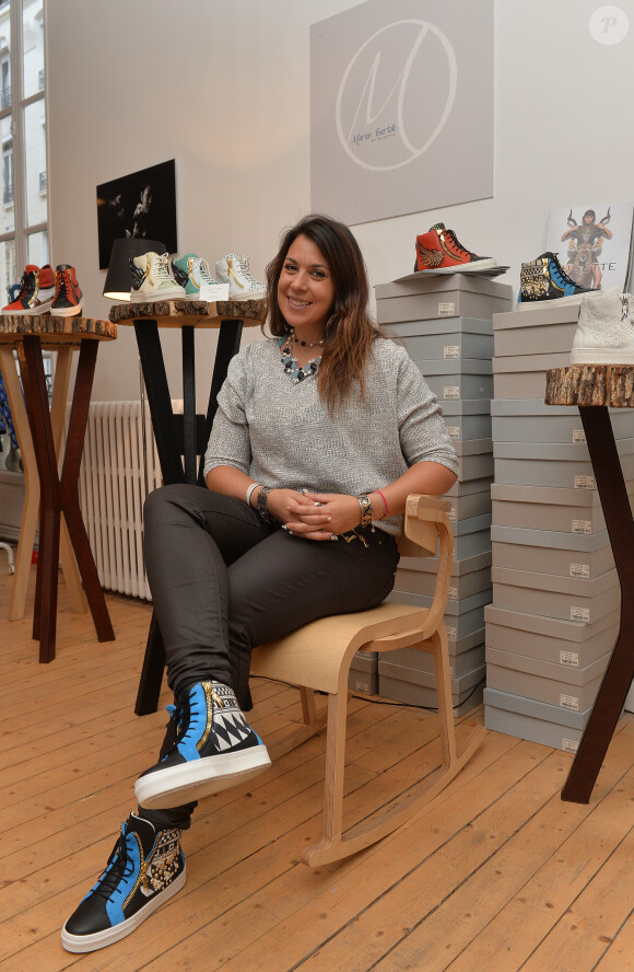 Marion Bartoli au concept Store L'Escabeau de Marie France pour la présentation de sa collection "M by Musette" à Paris le 6 décembre 2014