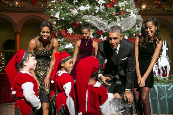 Le président Barack Obama, son épouse Michelle et leurs filles Malia et Sasha lors de l'enregistrement du concert Christmas in Washington à Washington, le 14 décembre 2014
