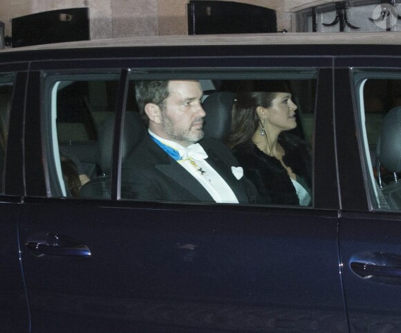 La princesse Madeleine de Suède, enceinte, et son mari Chris O'Neill ont assisté à la soirée de l'Académie de Suède à la Bourse de Stockholm. Le 20 décembre 2014.