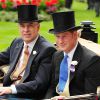 Le prince Harry et le prince Andrew lors de la procession royale au Royal Ascot le 19 juin 2014 à Ascot