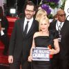 Patricia Arquette et son compagnon Eric White - "Je suis Charlie" à la 72e cérémonie annuelle des Golden Globe Awards à Beverly Hills, le 11 janvier 2015.
