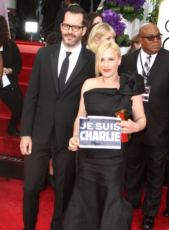 Patricia Arquette et son compagnon Eric White - "Je suis Charlie" à la 72e cérémonie annuelle des Golden Globe Awards à Beverly Hills, le 11 janvier 2015.