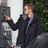 Exclusif - Hayden Christensen s'est arrêté mettre de l'essence dans sa magnifique voiture, une Audi R8, à Los Angeles. Le 11 janvier 2015 