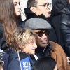 Yannick Noah et son fils Joalukas lors de la victoire du PSG face à Evian Thonon Gaillard au Parc des Princes à Paris le 18 janvier 2015